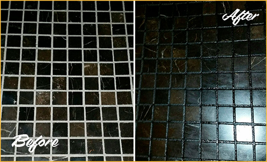 Before and After Picture of a Mustang Ridge Black Floor with Recolored Grout